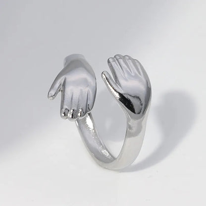Anillo de Acero Inoxidable, Boutique, Enchapado, Bisutería Fina, Forma de Manos, Abrazo, Estilo Casual, Unisexo, Color Sólido, Asimétrico